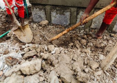 man digging the concrete